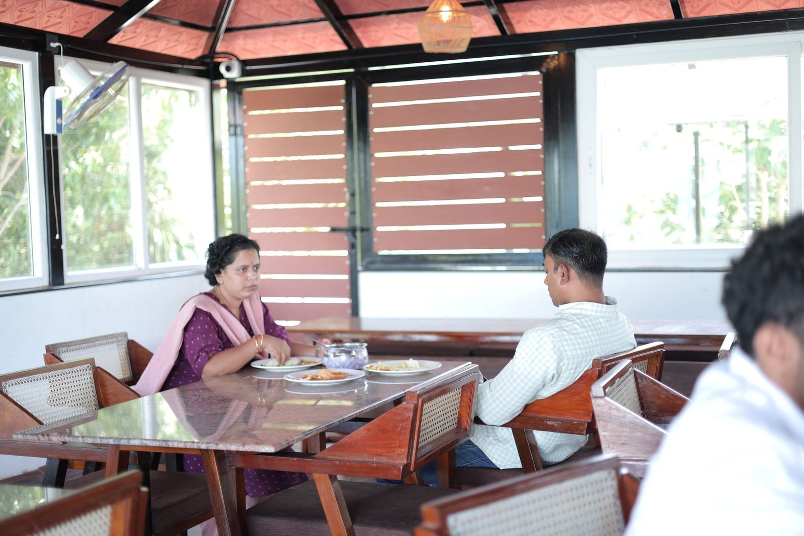 Guests at breakfast in the pavilion