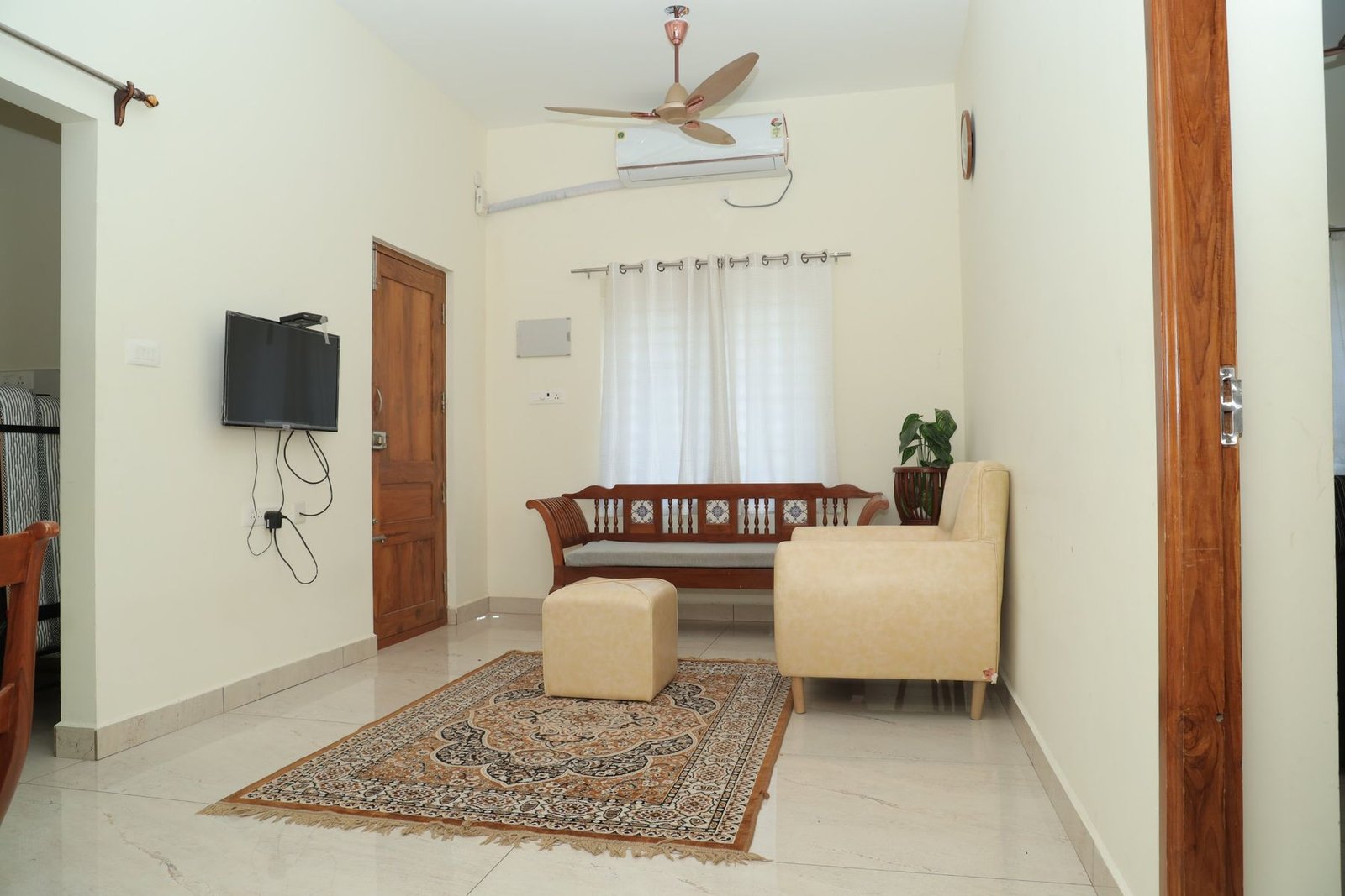 Lounge with teak bench and armchair